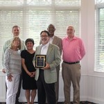 Award recipient John Walsh, the College Advisory Committee Members, and Dean Grant